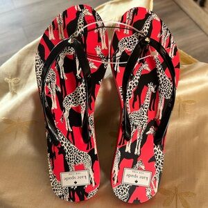 Kate Spade New York Feldon Red & Black Giraffe Print Flip Flop Sandals.